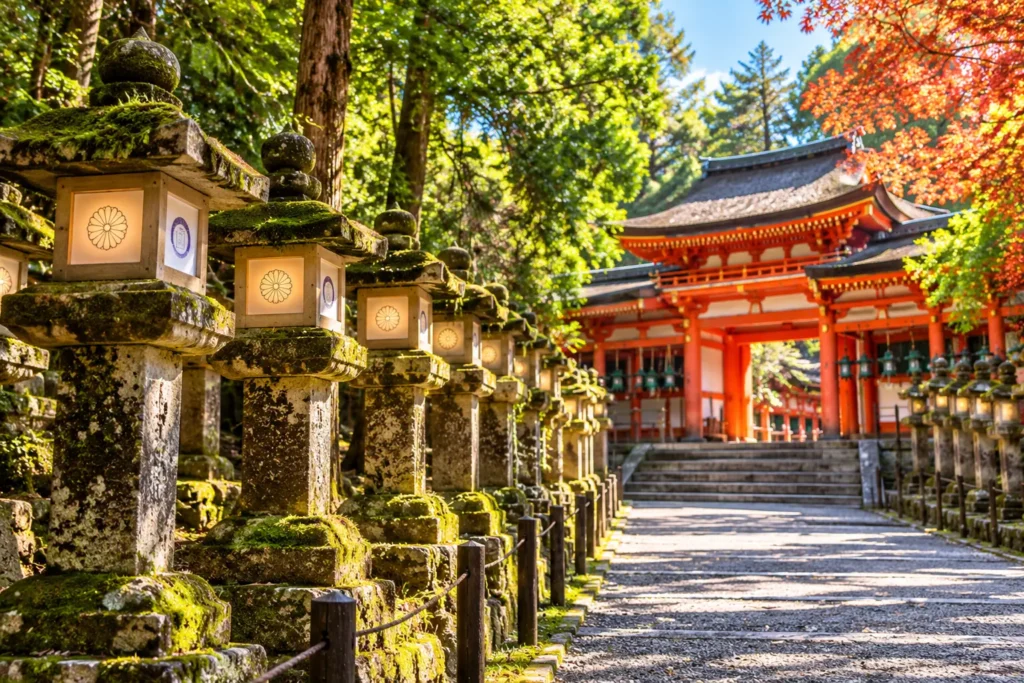 Traditional stone lanterns lining a forest pathway toward Kasuga Taisha Shrine in Nara, Japan